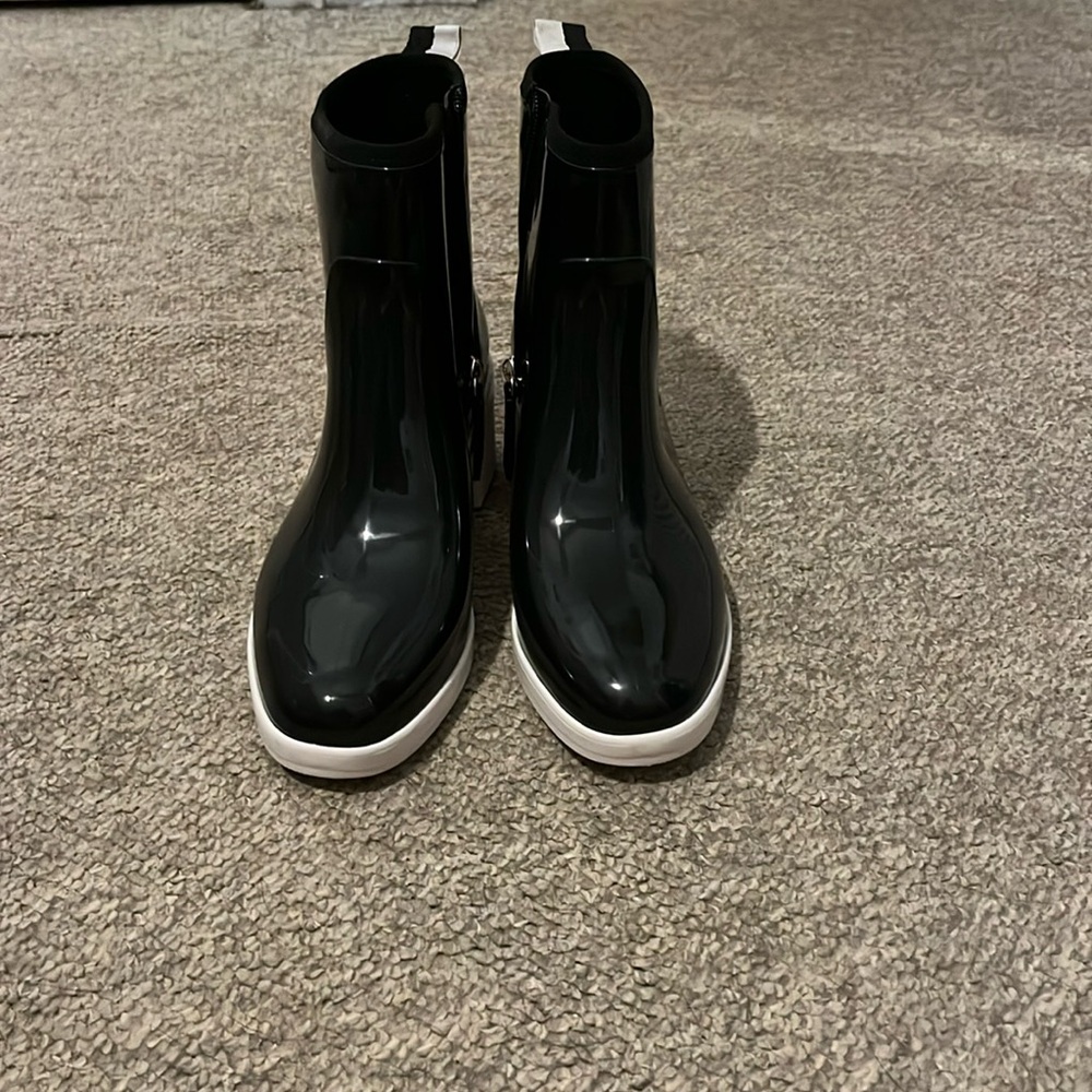 Kate Spade black and white rain boots.